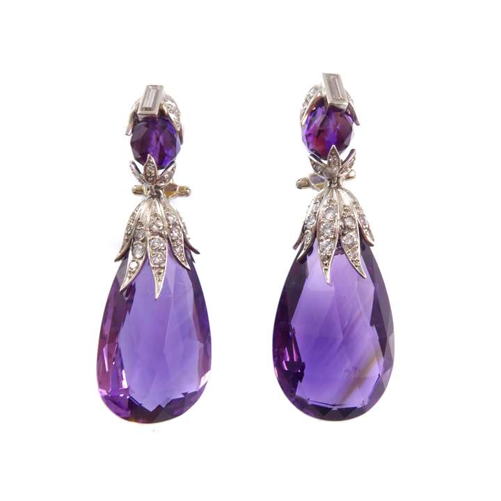 Pair of amethyst drop and diamond pendant earrings, hung each with a principal briolette cut amethyst drop